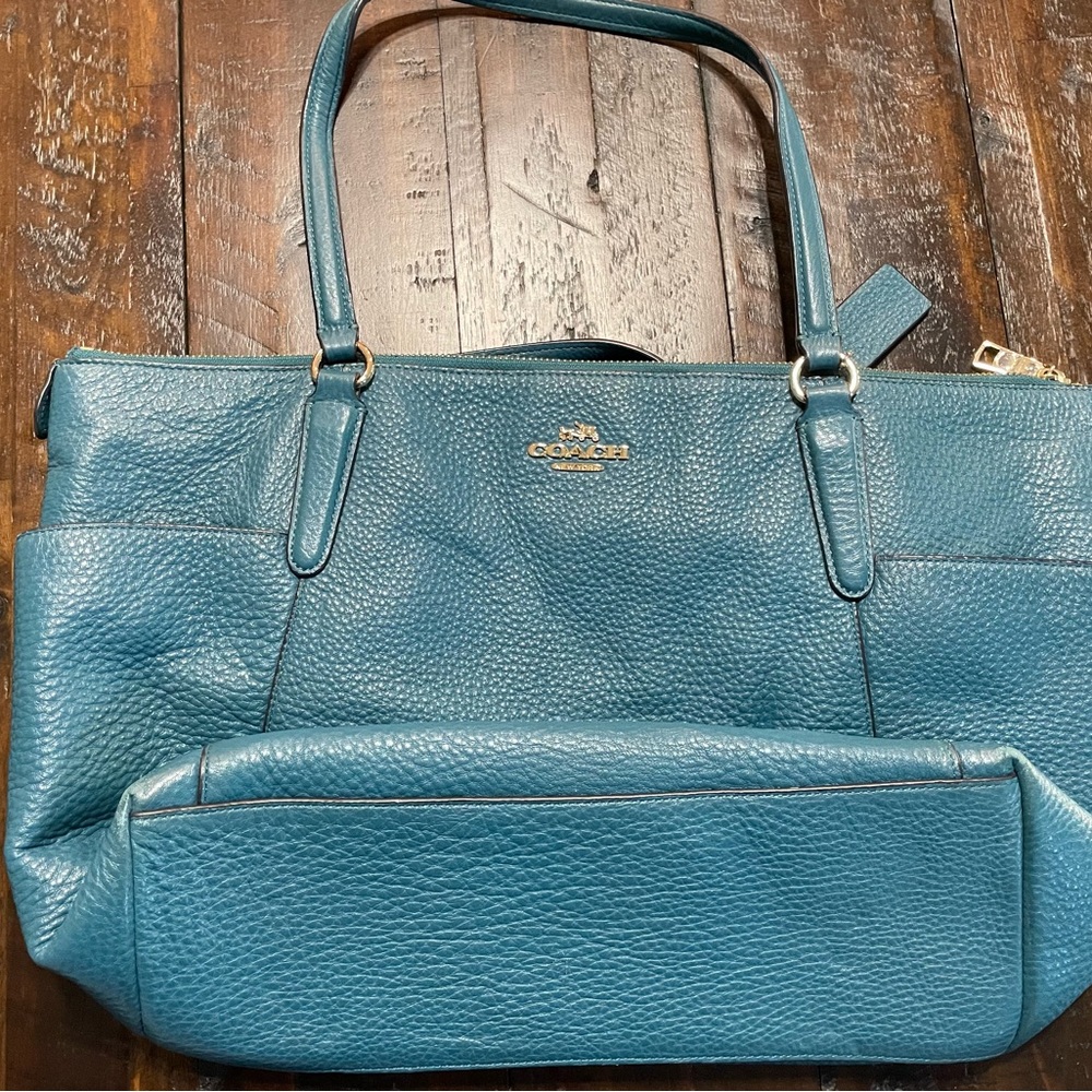 Teal soft leather Coach tote in very good condition.